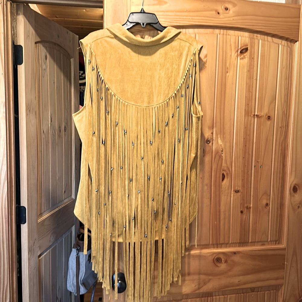 Fuax suede L & B sleeveless top with fringe and bead back.